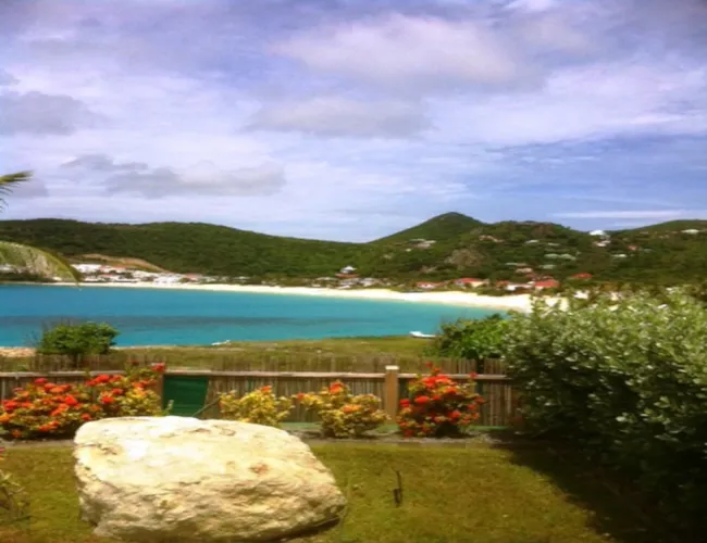 flamands beach as seen from the front yard of villa les embruns