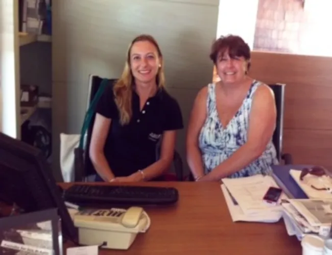 st barth properties st barth concierge magda votava confers with our us office concierge julia hurd e1371132721419