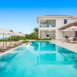 1.1 b.e. grace bay beachfront 5bd terrace