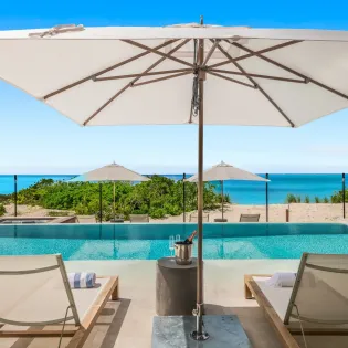 1.2 b.e. grace bay beachfront 5bd terrace