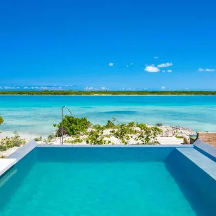 1 vacation rental photo Turks and Caicos PL BLC Villa Blondel Cove BLCpol03 desktop