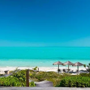 3 vacation rental photo Turks Caicos IE VAR Villa CasaVarnishkes varbch01 desktop