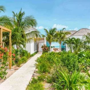7 vacation rental photo Turks and Caicos TC BLM Villa Beach Enclave blmext04 desktop