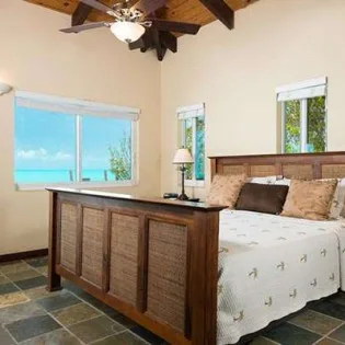 8 vacation rental photo Turks Caicos IE OCP Villa OceanPalms ocpbd201 desktop