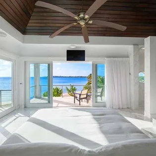 8 vacation rental photo Turks Caicos TC CAP Villa Capri capbd102 desktop