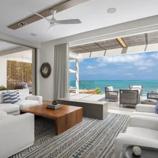 2.4 b.e. north shore beachfront villa 5bd living kitchen