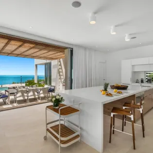 2.6 b.e. grace bay beachfront 5bd kitchen living
