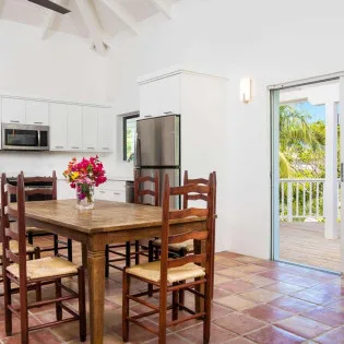 1 vacation rental photo Turks and Caicos TC GRT Villa Grace Too GRTdin02 desktop