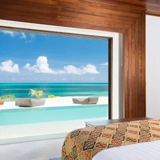 8 vacation rental photo Turks And Caicos IE KAN Villa Beach Kandi kanbd101 desktop
