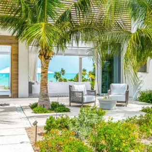 8 vacation rental photo Turks and Caicos TC BLC Villa Beach Enclave blcpat01 desktop