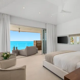 3.1 b.e. grace bay beachfront 5bd bedroom 1