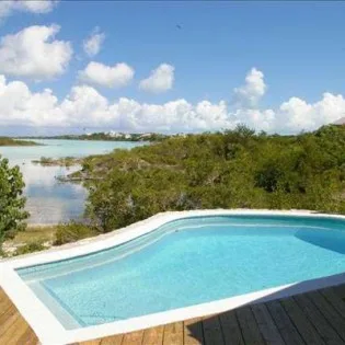  vacation rental photo Turks Caicos IE SRV Villa Serene srvpol01 desktop