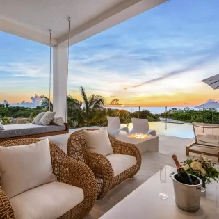 7.1 b.e. grace bay beachfront 5bd night view