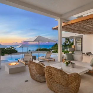 7.2 b.e. grace bay beachfront 5bd night view