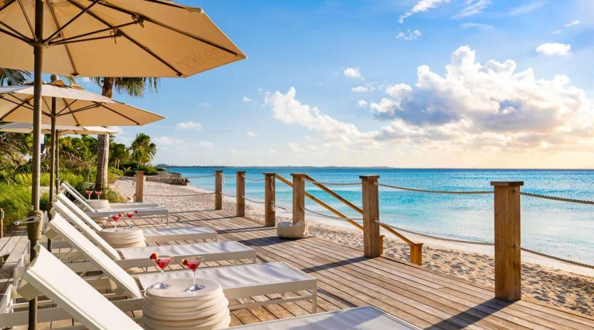 1 vacation rental photo Turks and Caicos PL SEN Villa Sentosa SENdek01 desktop