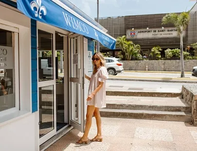 girl walking into the wimco office