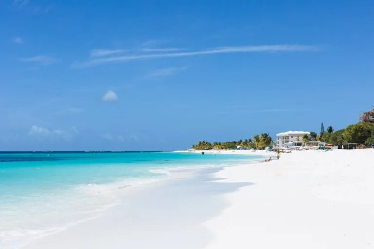 Anguillas Shoal Bay East a white sand beach with clean blue water. 