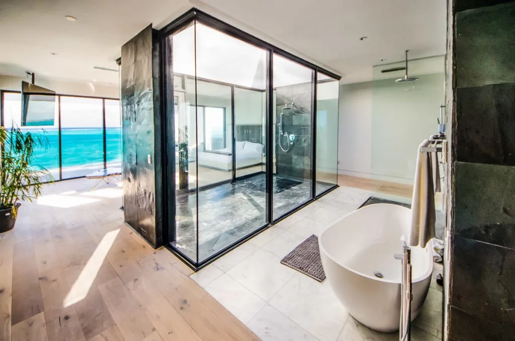 The master bedroom features a rain shower