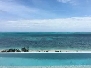 At PL BNC. I love how the beach is just below, but you have this pristine ocean view. WIMCO Villas, Beach Enclave, PL BNC, Turks & Caicos, Babalua Beach, Family Friendly Villa, 4 Bedroom Villa, 4 Bathroom Villa, Pool, View from Villa, WiFi