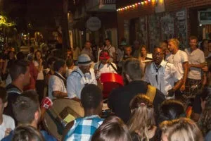 The Calypso Band plays outside Le Select as the crowd grows.