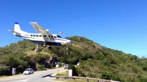 Airplanes regularly land above the roundabout towards St. Jean.