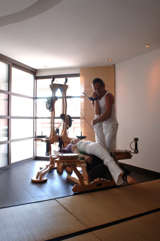 Gyrotonics in action, a practice that helps restore mobility in the spine and hips