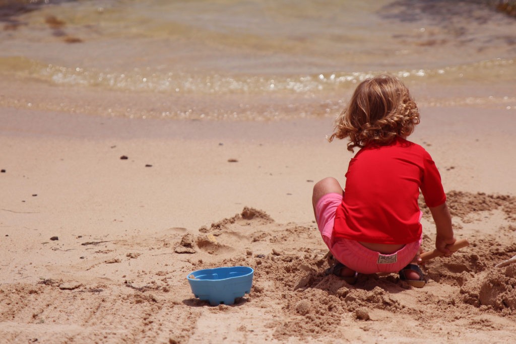 Toddler playing on St Barths Beach