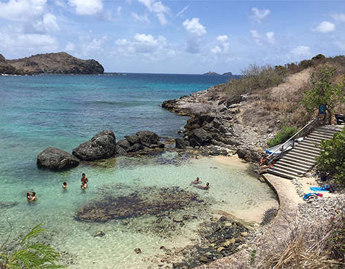 Shallow waters for sunning at La Petite Anse.