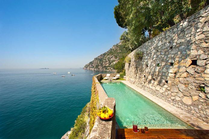Two bedroom water front villa on the Amalfi Coast in Italy with a pool overlooking the sea.