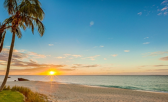 Take in a Caribbean Sunset: Evening Sky Pageantry From the Beachfront (or the Water)